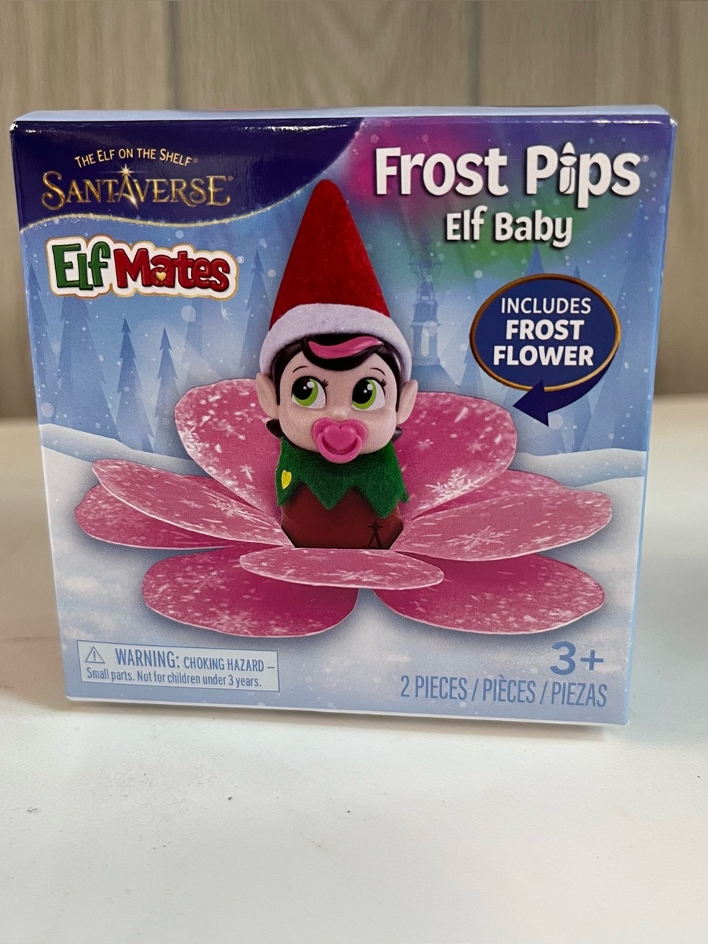 Pink Elf Mates Frost Pips Baby Girl with Flower From Elf on the Shelf SantaVerse